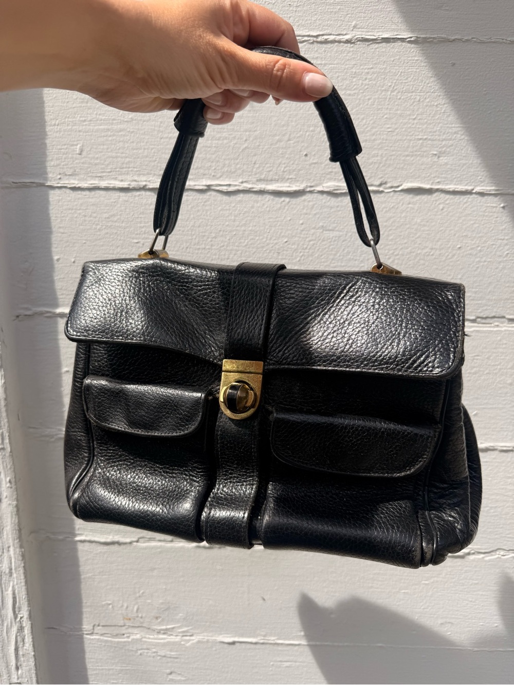 Classic Black Leather Top-Handle Bag with Gold Hardware